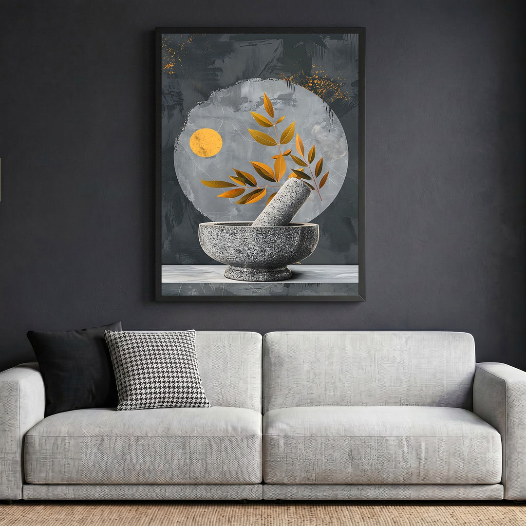 Wadi Home abstract botanical mortar and pestle wall art print with gold accents in a black frame above a grey sofa.