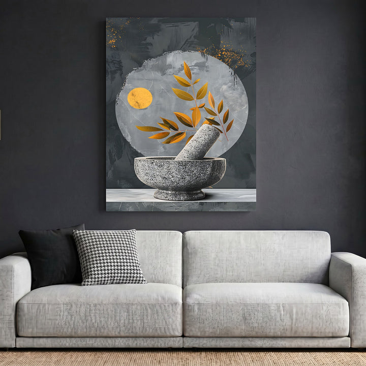 Wadi Home abstract botanical mortar and pestle wall art print with gold accents hanging above a modern grey sofa.