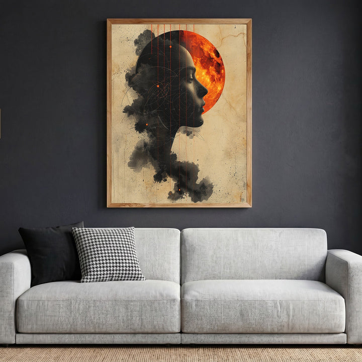 Wadi Home framed wall art featuring a surreal silhouette profile against a fiery red moon on a vintage parchment background.
