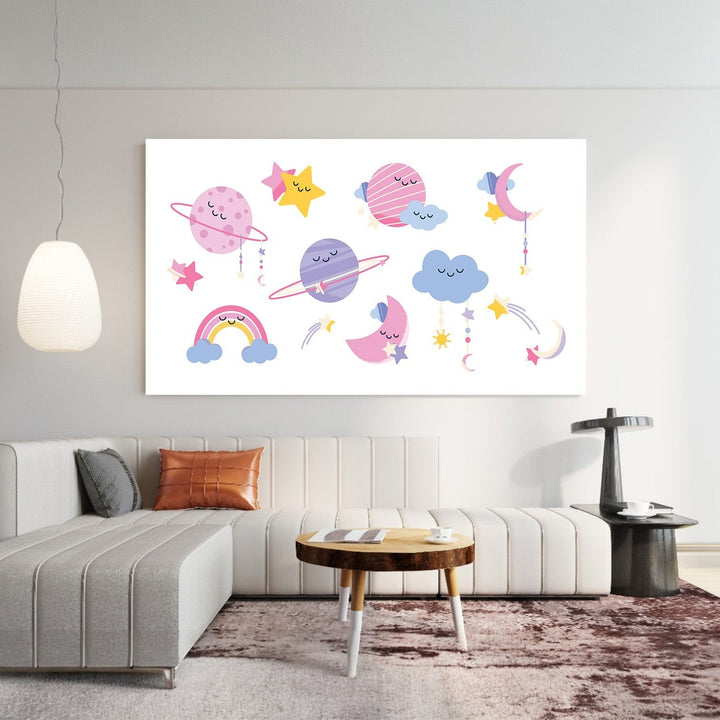 Wadi Home whimsical celestial wall art with smiling planets, moons, and stars in pastel colors in a modern living room