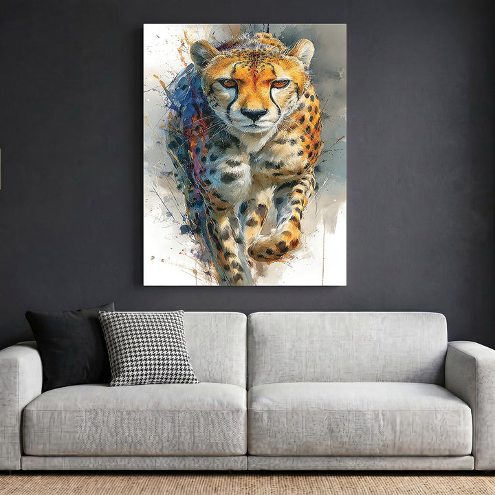 Wadi Home cheetah wildlife framed print with vibrant watercolor style art hanging above a modern grey sofa.