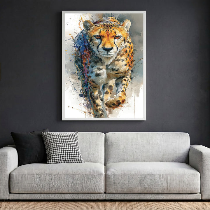 Wadi Home cheetah wildlife framed wall art print with vibrant brushstroke details hanging above a modern sofa.