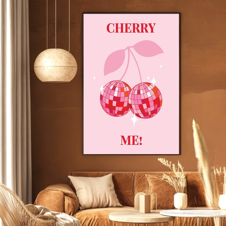 Wadi Home Cherry Me! wall art print featuring disco ball cherries on a pastel pink background in a modern living room.