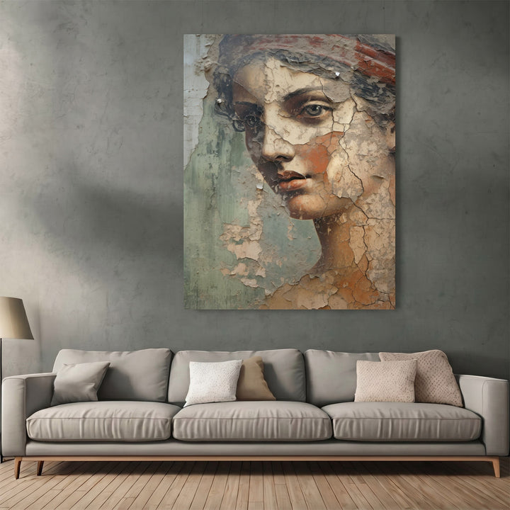 Wadi Home classical portrait wall art with distressed fresco texture hanging above a modern grey sofa in a living room