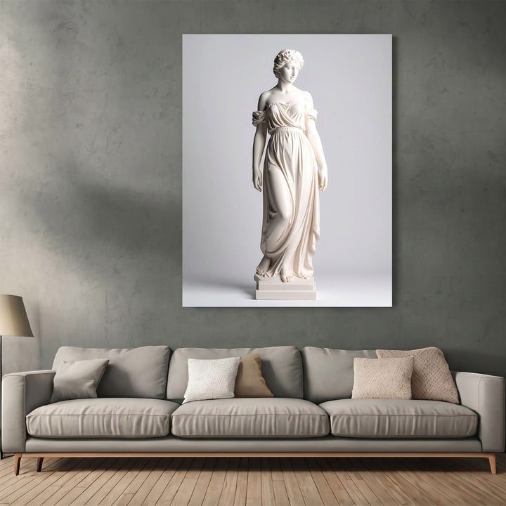 Wadi Home classical statue wall art print featuring a Greco-Roman figure above a modern grey sofa in a living room.