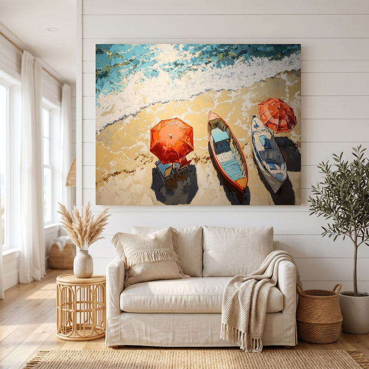 Wadi Home coastal beach scene framed wall art featuring vibrant rowboats and umbrellas above a beige sofa in a living room