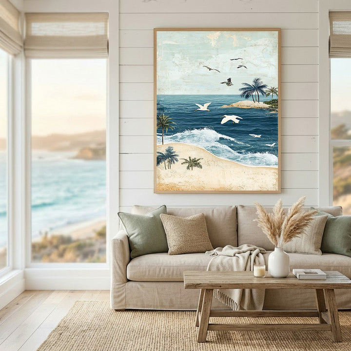 Wadi Home coastal tropical beach landscape wall art print featuring blue ocean waves, palm trees, and birds in a room.