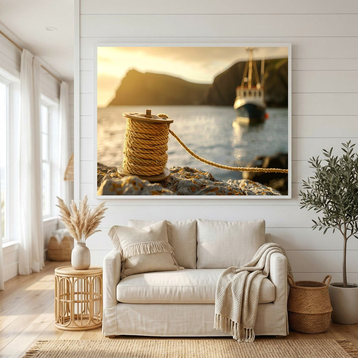 Wadi Home coastal harbor scene framed wall art print featuring a golden hour boat and rope, displayed in a living room.