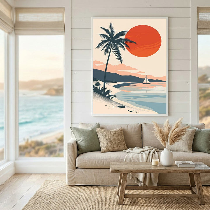 Wadi Home tropical coastal landscape wall art print featuring a sunset, palm tree, and sailboat in a living room.