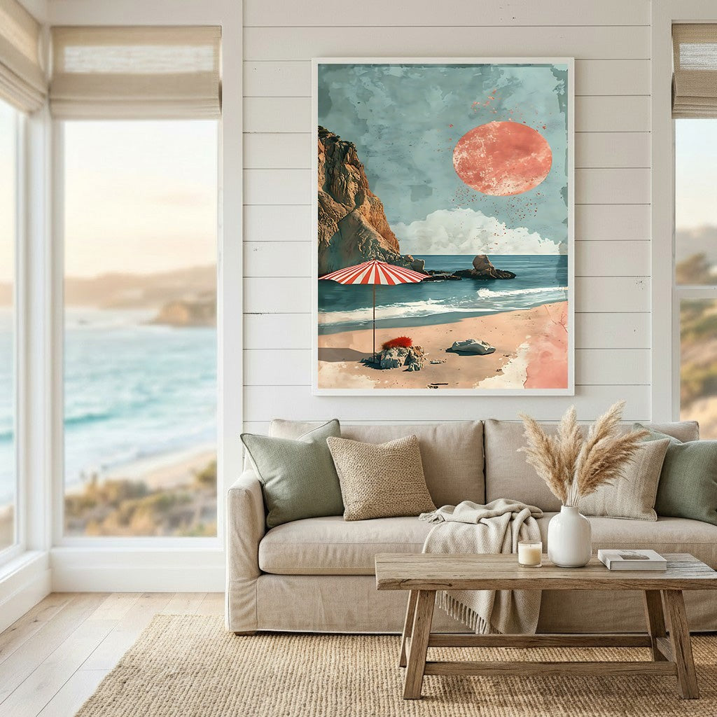 Wadi Home coastal landscape wall art print featuring a red sun, cliffside, and striped umbrella in a living room.