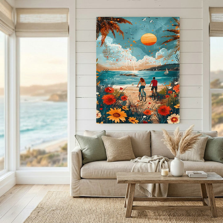 Wadi Home coastal landscape wall art print featuring a couple cycling by the ocean with vibrant flowers and sunset