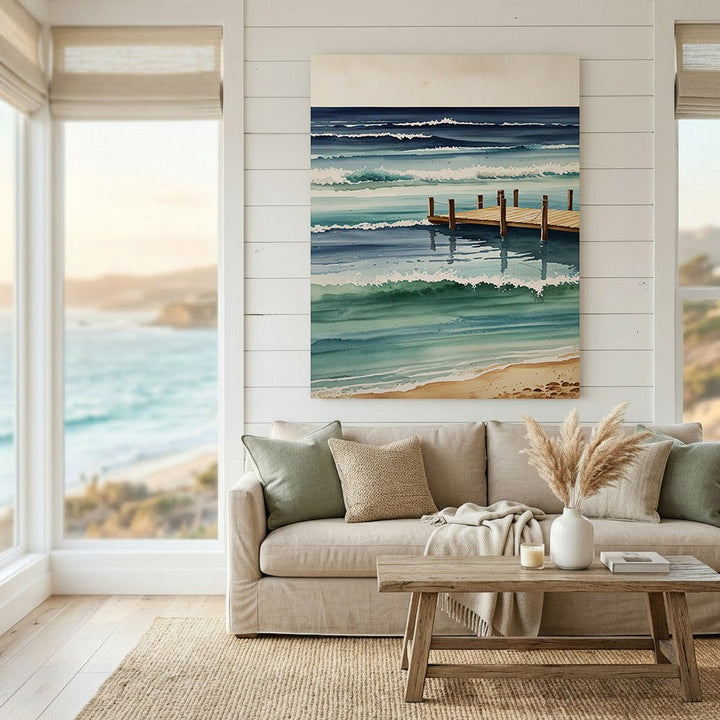 Wadi Home watercolor coastal pier wall art featuring ocean waves in blue and teal tones above a neutral living room.