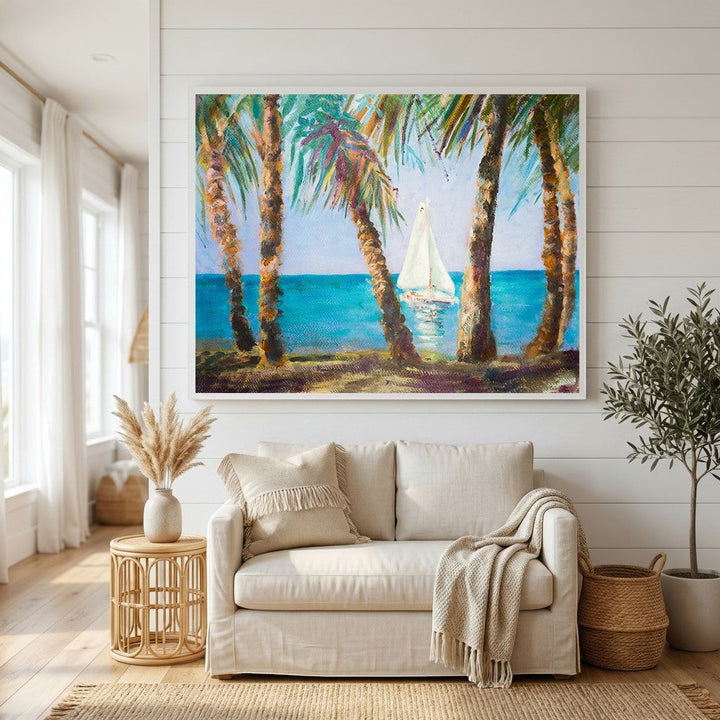 Wadi Home coastal sailboat landscape wall art featuring palm trees and turquoise water in a modern living room setting.