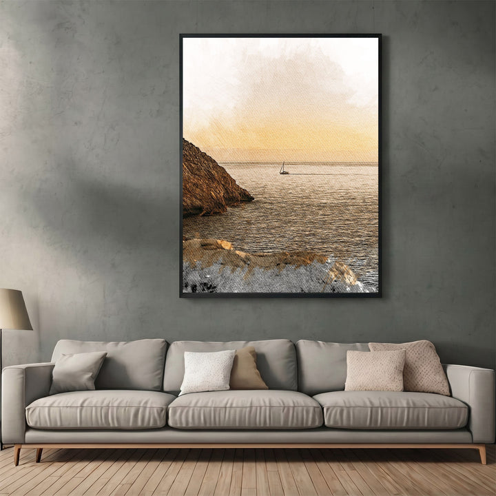 Wadi Home coastal sailboat landscape wall art in a black frame hanging above a modern grey sofa in a living room.