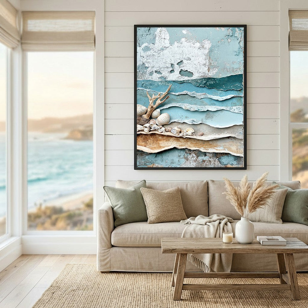 Wadi Home coastal shoreline textured wall art with blue, beige, and white layers, driftwood, and seashells in a living room.