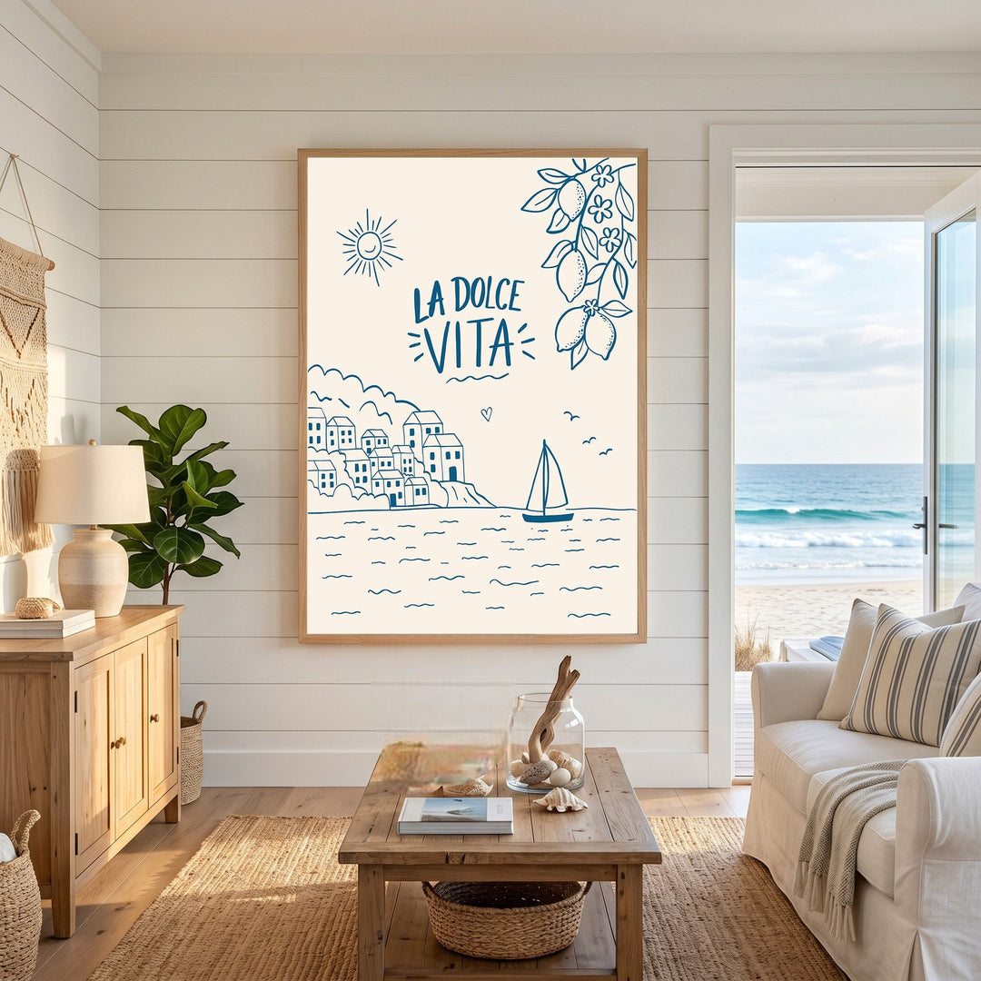 Wadi Home La Dolce Vita coastal wall art print featuring blue line-art of a Mediterranean village and lemons on cream.