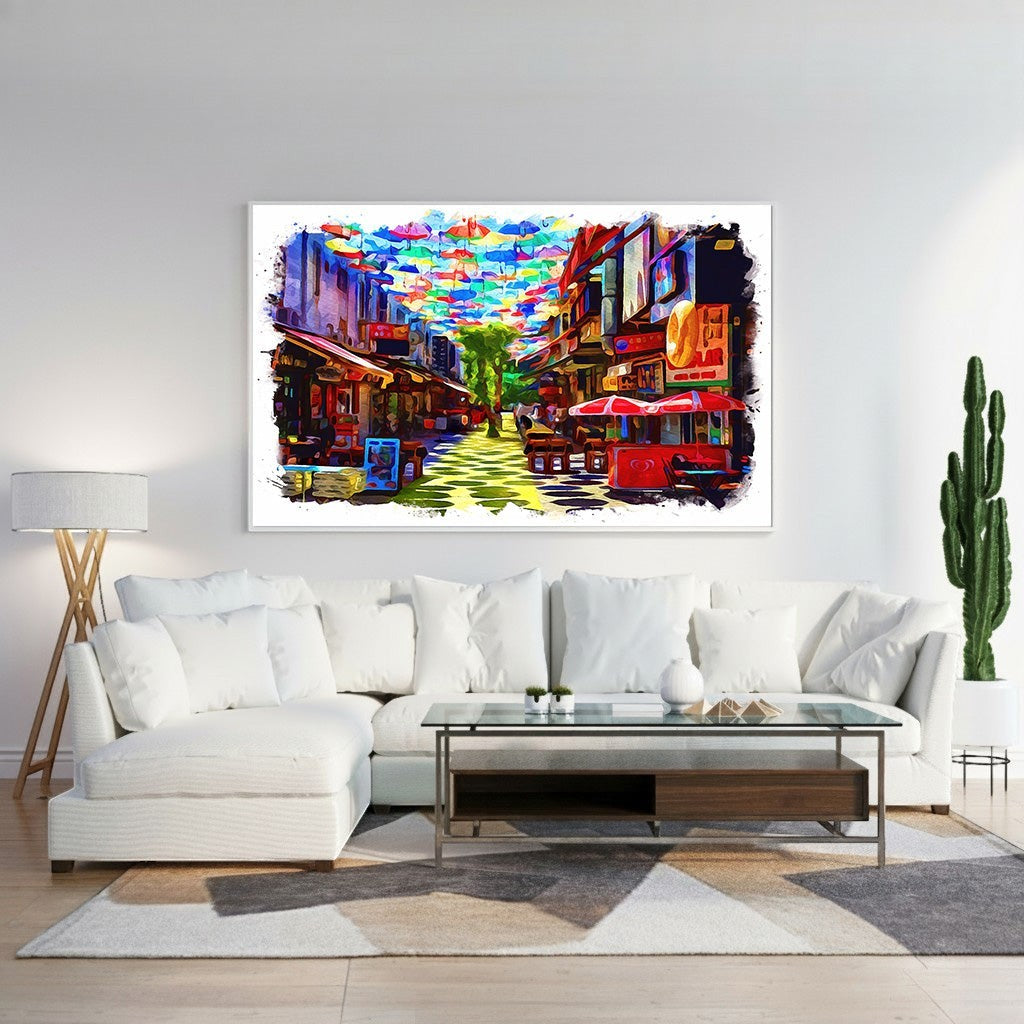 Wadi Home canvas print of a colorful street scene with many bright umbrellas overhead. Watercolor-inspired art.