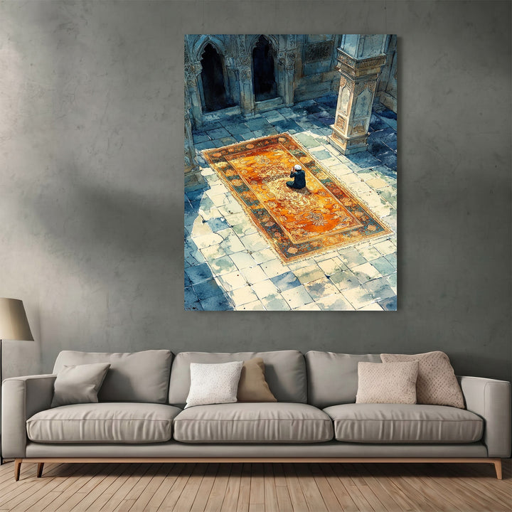 Wadi Home decorative wall art print featuring a person praying on an ornate rug in a sunlit stone courtyard.