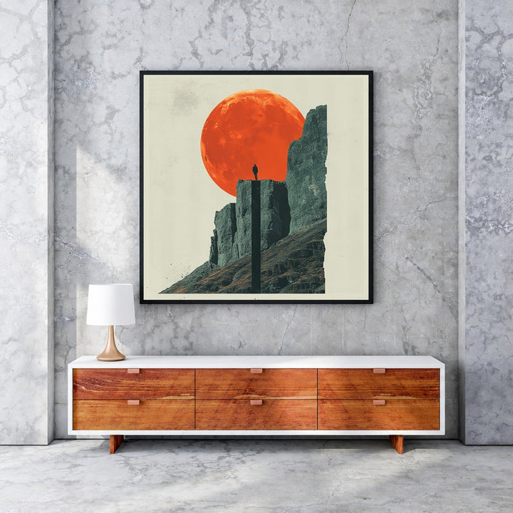 Wadi Home 'Solitude Under The Crimson Moon' art print: lone figure on mountain peak against large crimson moon.