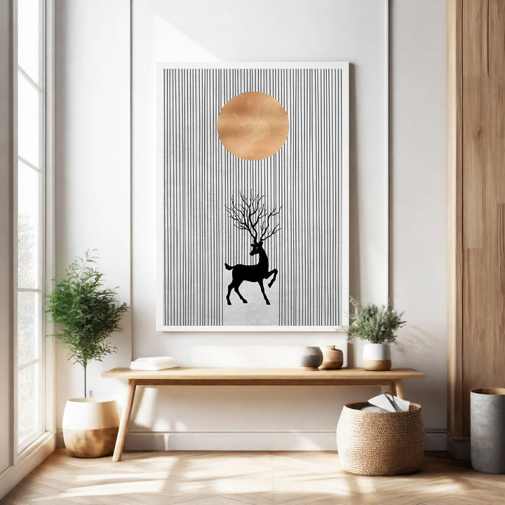 Wadi Home Deer Silhouette Wall Art with sun and minimalist lines. Black deer silhouette with tree-like antlers against a white background with black vertical lines and a copper sun.