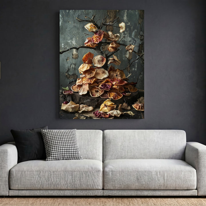 Wadi Home framed wall art featuring a moody dried botanical still life print hanging above a modern grey sofa.