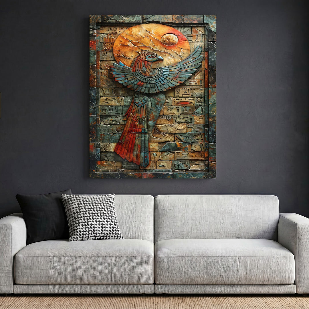 Wadi Home Ancient Egyptian style wall art with a falcon relief, terracotta and blue tones, hanging above a sofa.