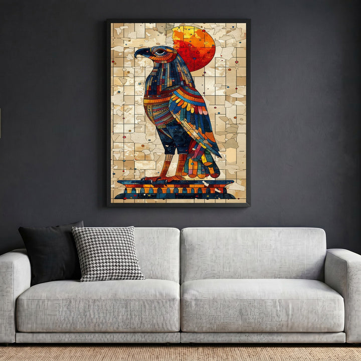 Wadi Home ancient Egyptian style falcon wall art print with mosaic patterns in blue and orange hanging above a sofa.