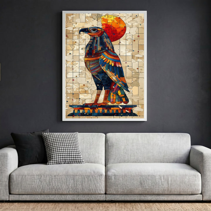 Wadi Home ancient Egyptian style falcon wall art print with mosaic patterns in blue and orange on a grey wall.