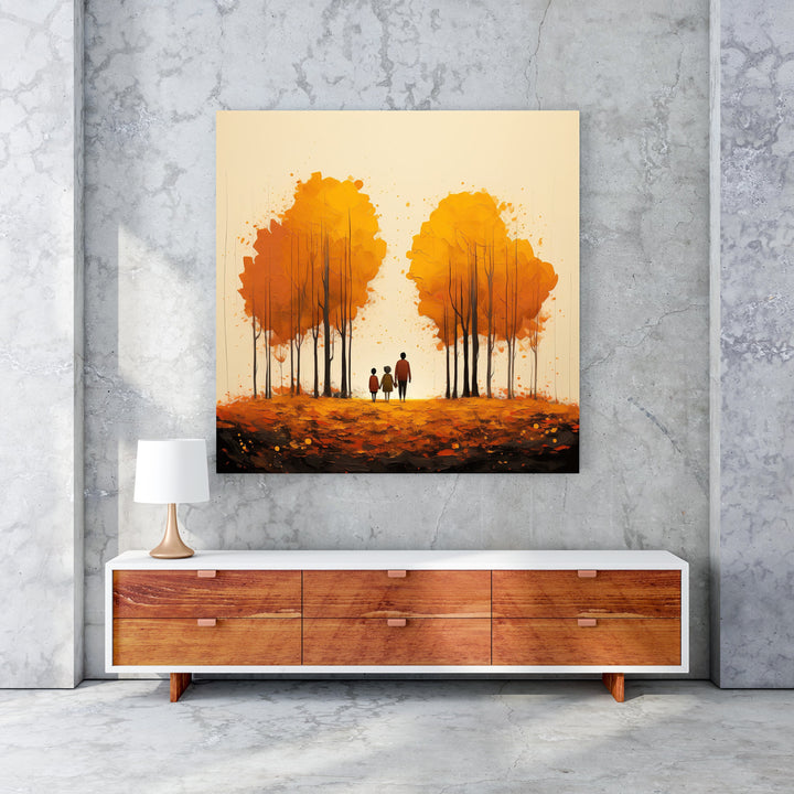 Wadi Home autumn trees wall art featuring a family silhouette walking through golden trees and fallen leaves.