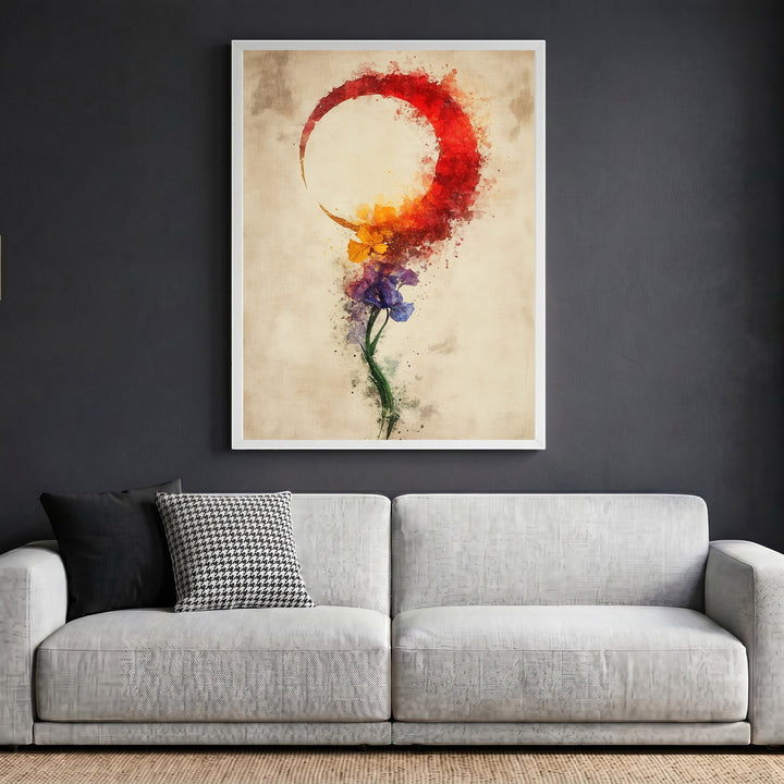 Wadi Home abstract floral crescent moon wall art print in a white frame hanging above a modern grey sofa.