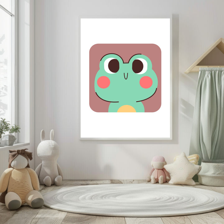 Wadi Home cute green frog face nursery art with pink cheeks and a brown background.