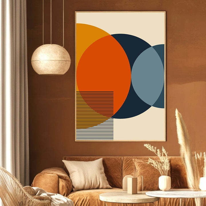 Wadi Home modern geometric abstract wall art print with navy, orange, and slate blue circles in a living room.