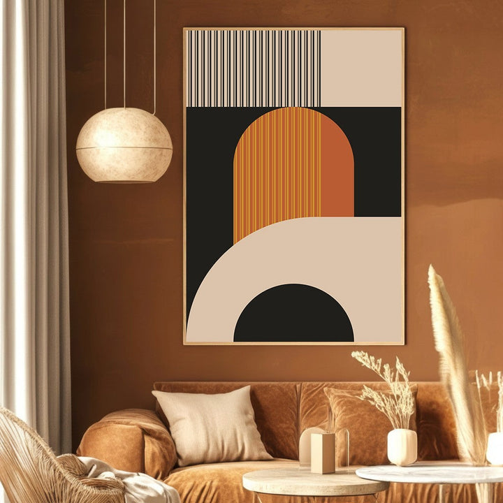 Wadi Home modern geometric abstract wall art print featuring black, cream, and burnt orange shapes in a living room.