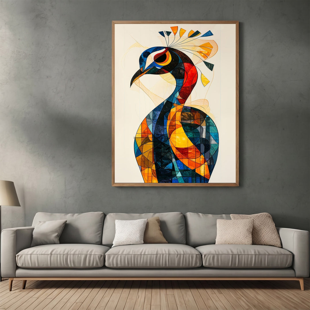 Wadi Home abstract geometric peacock wall art print with vibrant blue and orange patterns hanging above a grey sofa.