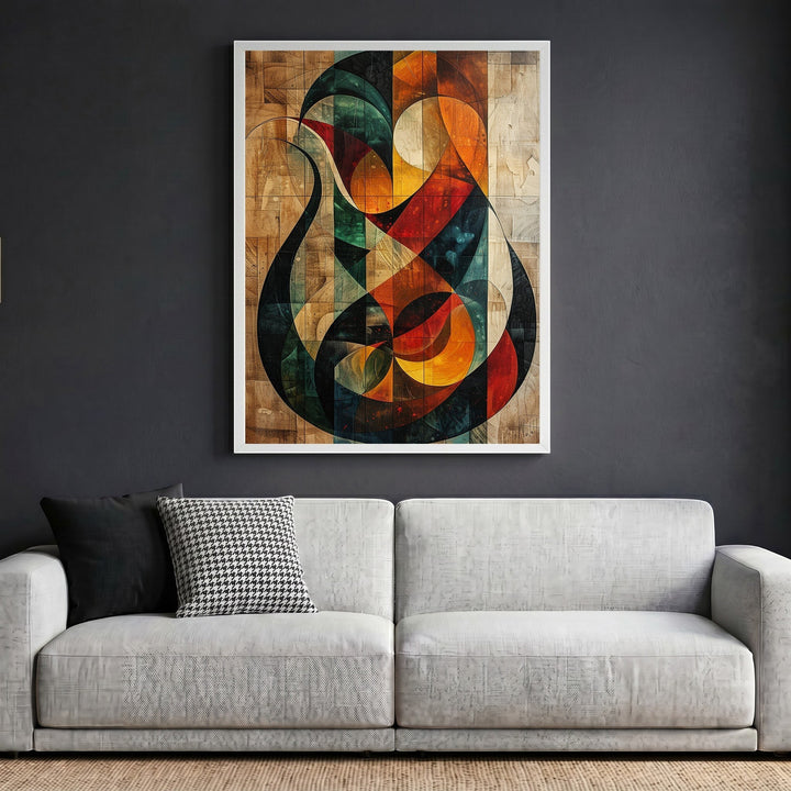 Wadi Home abstract geometric wood panel wall art with red, orange, and teal tones in a white frame above a grey sofa.