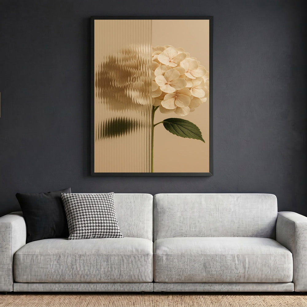 Wadi Home hydrangea botanical wall art print with fluted glass effect in a black frame above a modern grey sofa.