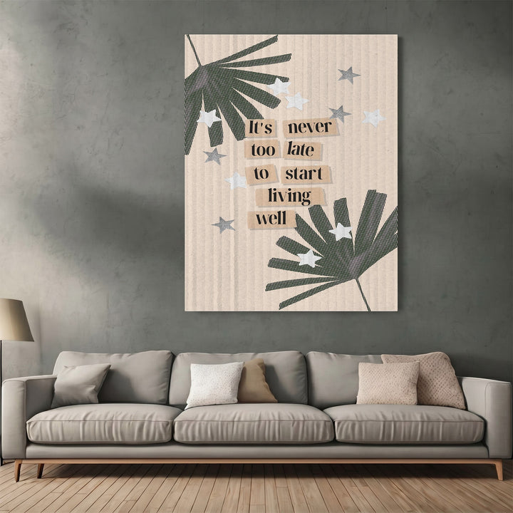 Wadi Home framed wall art with botanical leaves, stars, and the quote It's never too late to start living well.