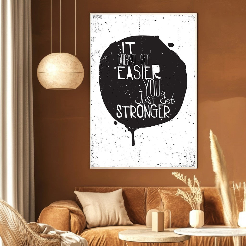 Wadi Home inspirational quote wall art featuring black ink-blot typography on white, displayed in a modern living room.