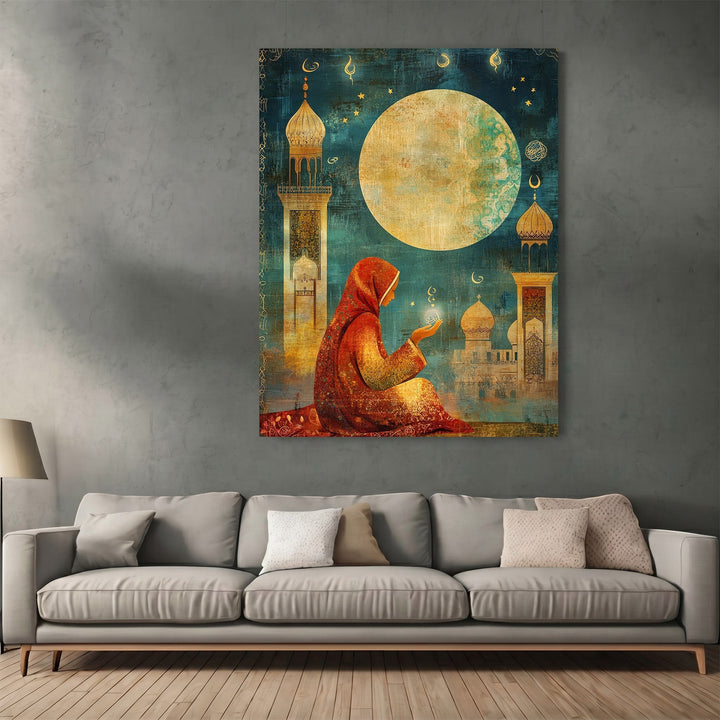 Wadi Home wall art featuring a woman praying under a full moon with mosque architecture in rich gold and blue tones.