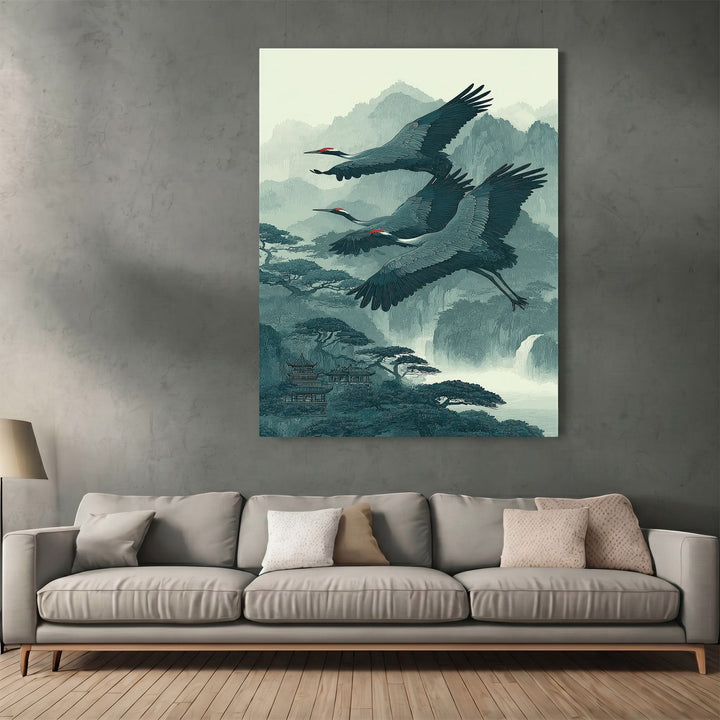 Wadi Home Japanese crane landscape wall art print featuring flying cranes over misty mountains in teal and cream tones.