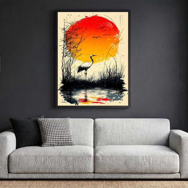 Wadi Home Japanese inspired crane wall art print featuring a red sun and ink-wash marsh scene above a modern sofa.