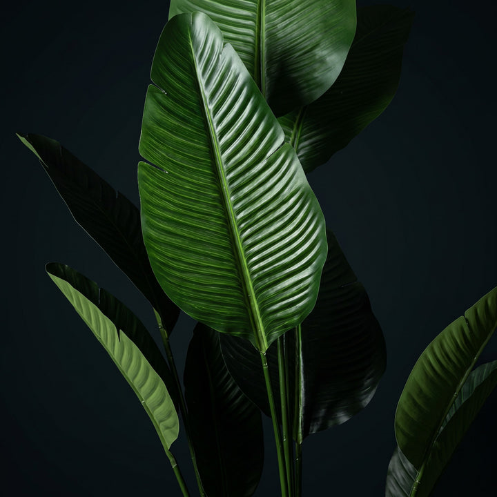 Wadi Home Large Bird of Paradise artificial plant with lush green leaves and intricate veining. Realistic tropical decor.