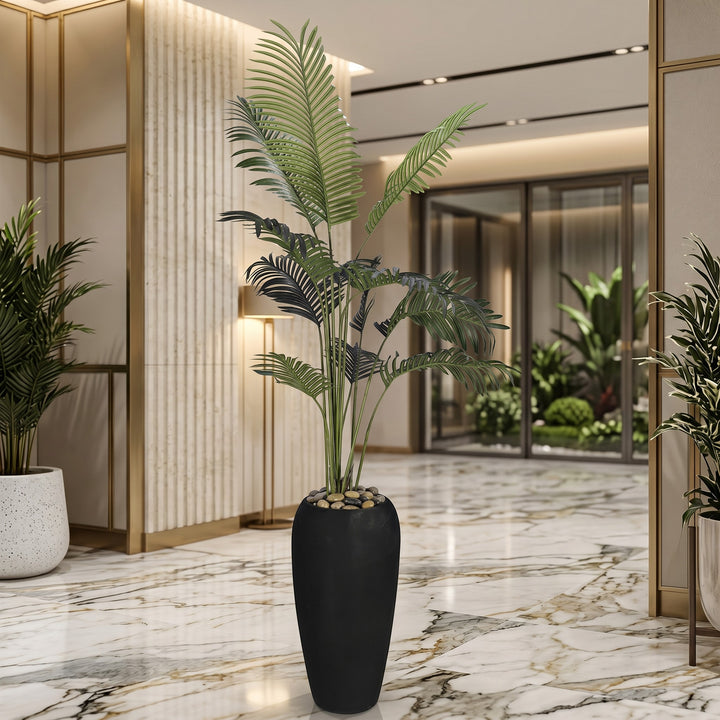 Wadi Home Large Faux Areca Palm Plant in tall black planter with river stones, lush green fronds.