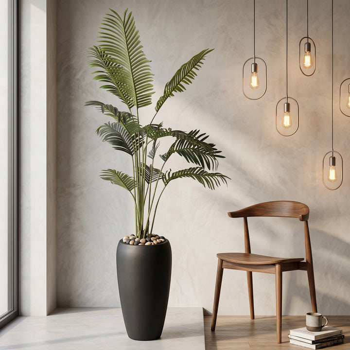 Wadi Home Large Faux Areca Palm Plant in tall black planter with river stones, lush green fronds.