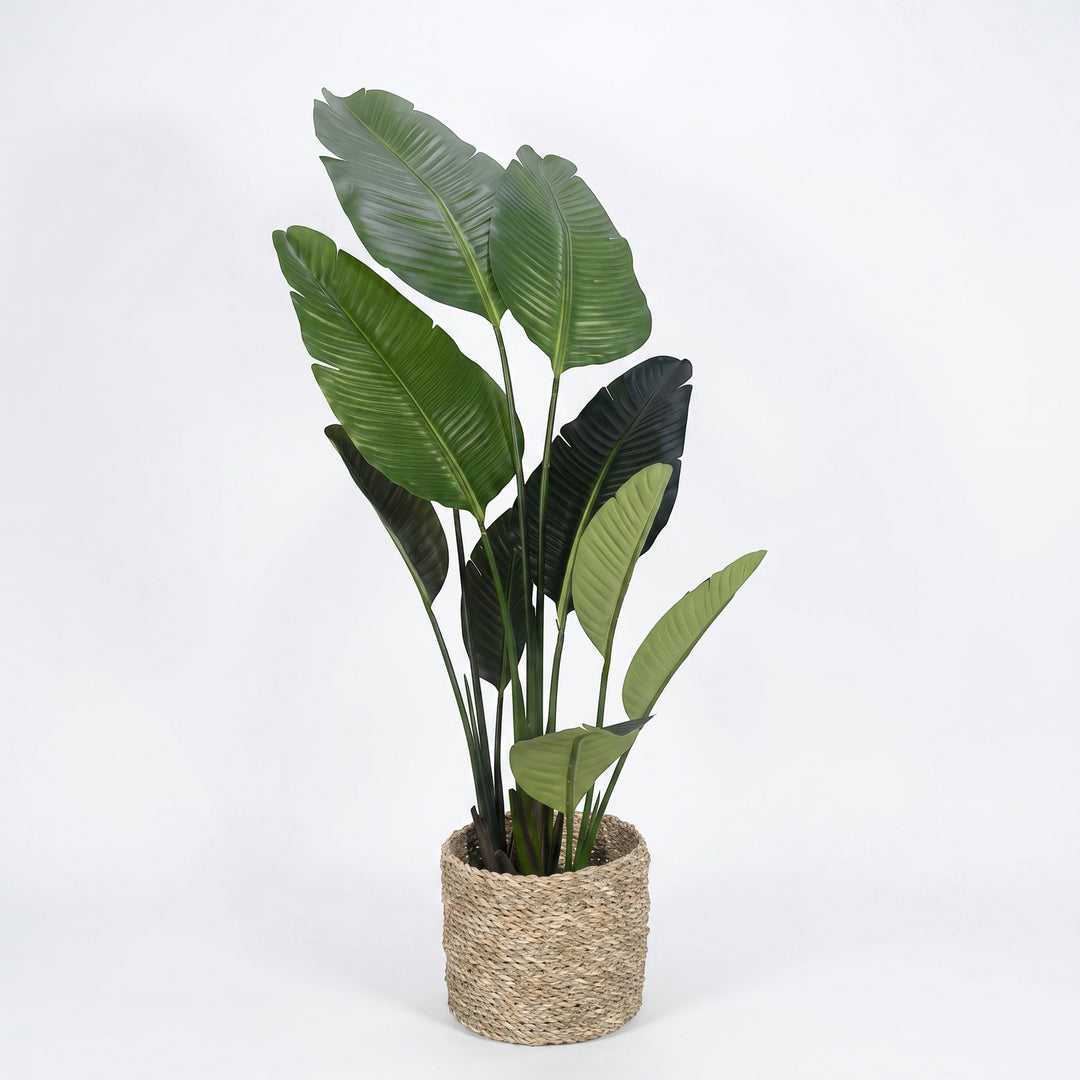 Wadi Home Large Fiddle Leaf Fig artificial plant with lush green leaves in a woven basket. Realistic veining and varied leaf sizes.