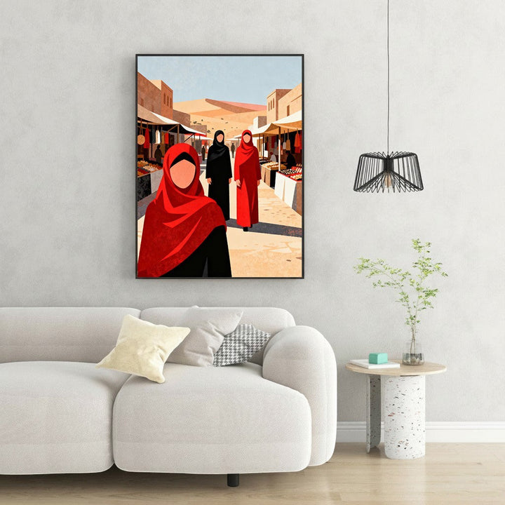 Wadi Home art print of women in traditional red and black attire walking through a desert marketplace.