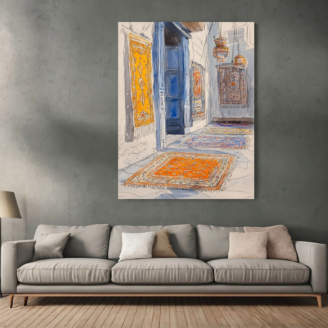 Wadi Home watercolor wall art print of a Middle Eastern bazaar with ornate rugs hanging in a living room setting.