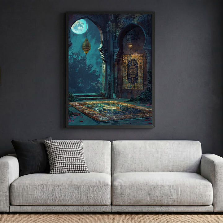 Wadi Home framed moonlit archway wall art print featuring a golden lantern and ornate rug above a modern grey sofa.