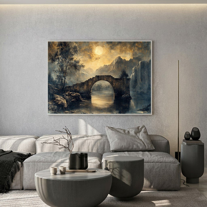 Wadi Home moonlit stone bridge landscape wall art print in a modern living room with a grey sofa and coffee tables.