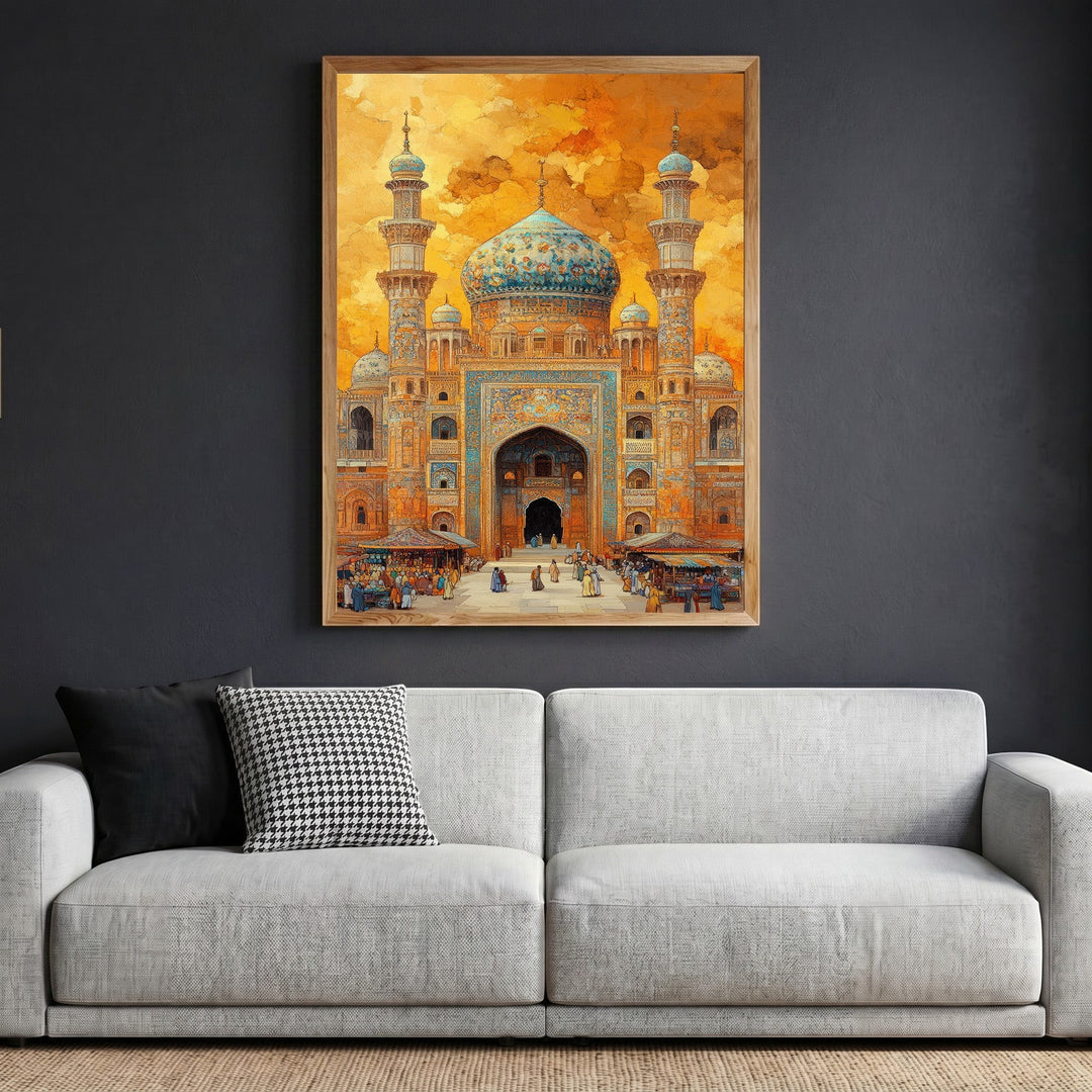 Wadi Home framed wall art featuring traditional mosque architecture with blue tiles and a warm orange sky above a sofa.